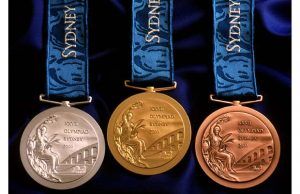 een gouden, zilveren en bronzen medaille van de olympische spelen in sydney 2000